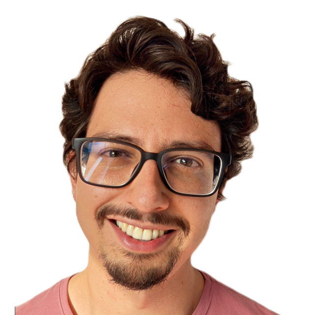 Juan Herrera smiling and waving